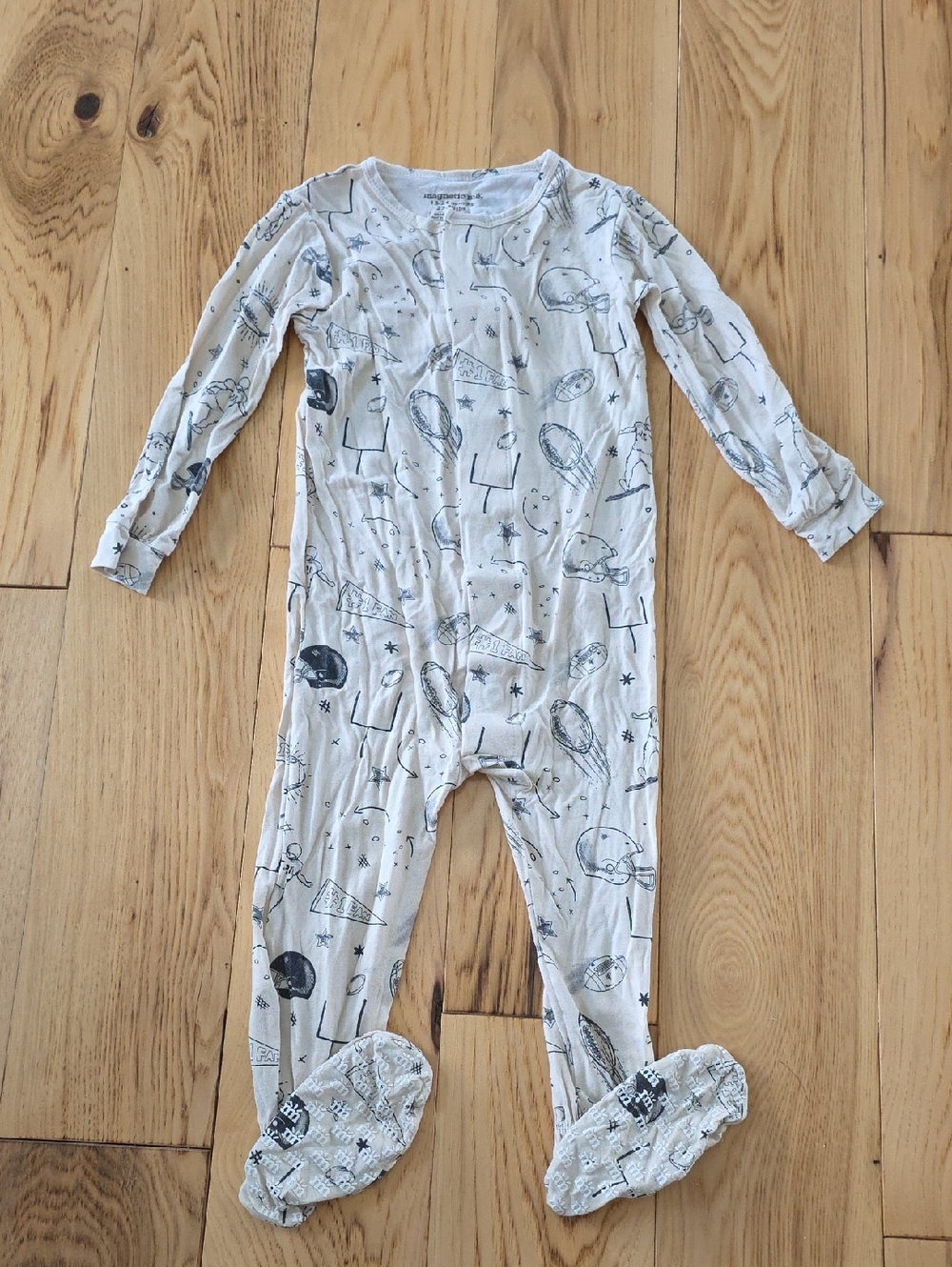 Magnetic Me Cream One-Piece Footed Pajamas with Navy Football Sketches